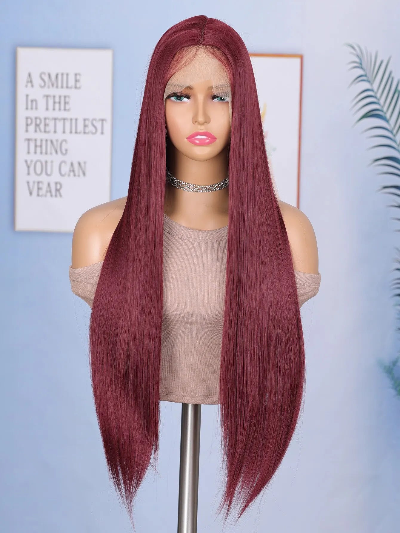 Enhance your style with this 24-inch straight lace front wig. Featuring a sleek black color, this wig is suitable for daily wear, providing a stylish and effortless look. -