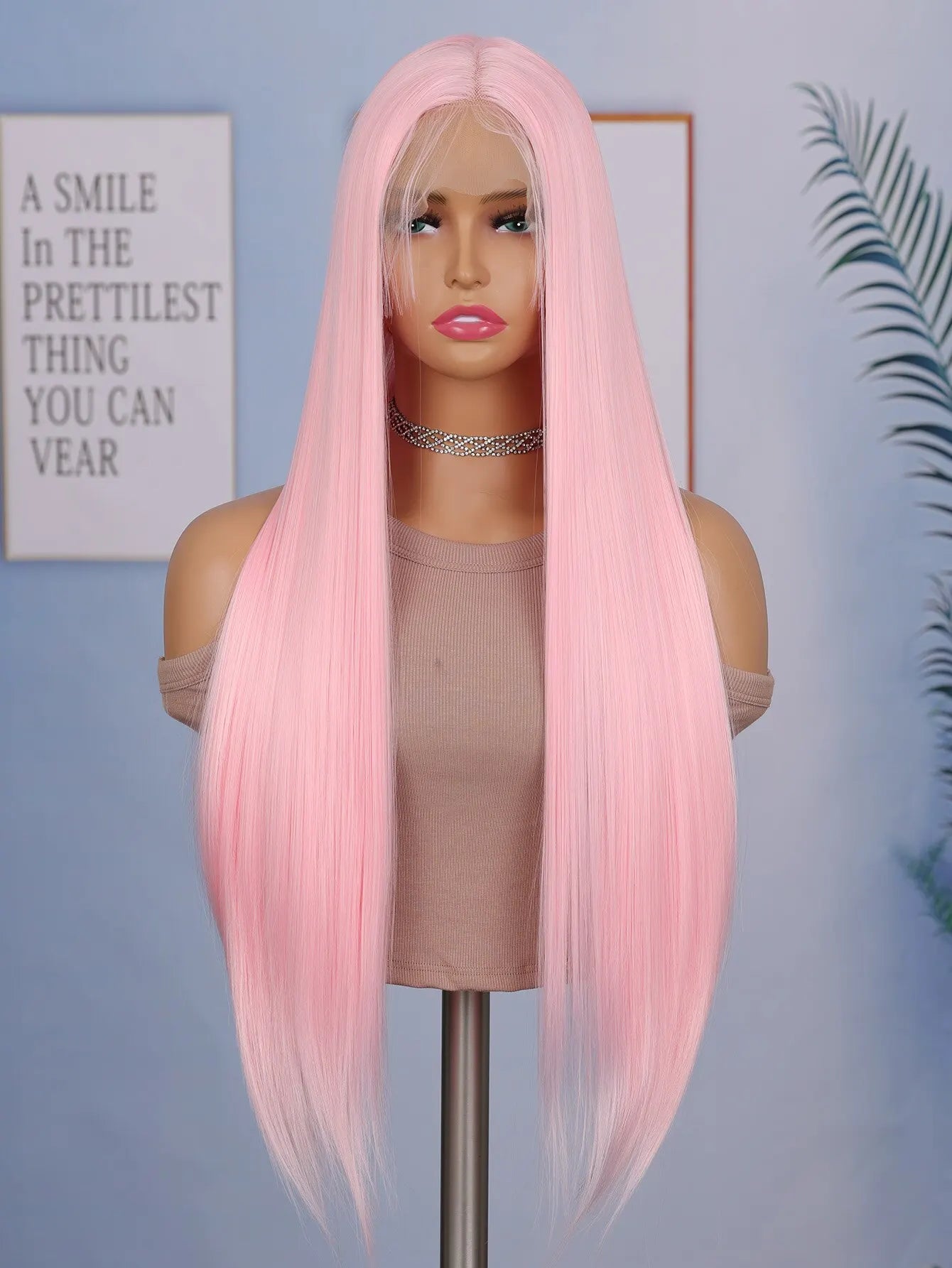 Enhance your style with this 24-inch straight lace front wig. Featuring a sleek black color, this wig is suitable for daily wear, providing a stylish and effortless look. -