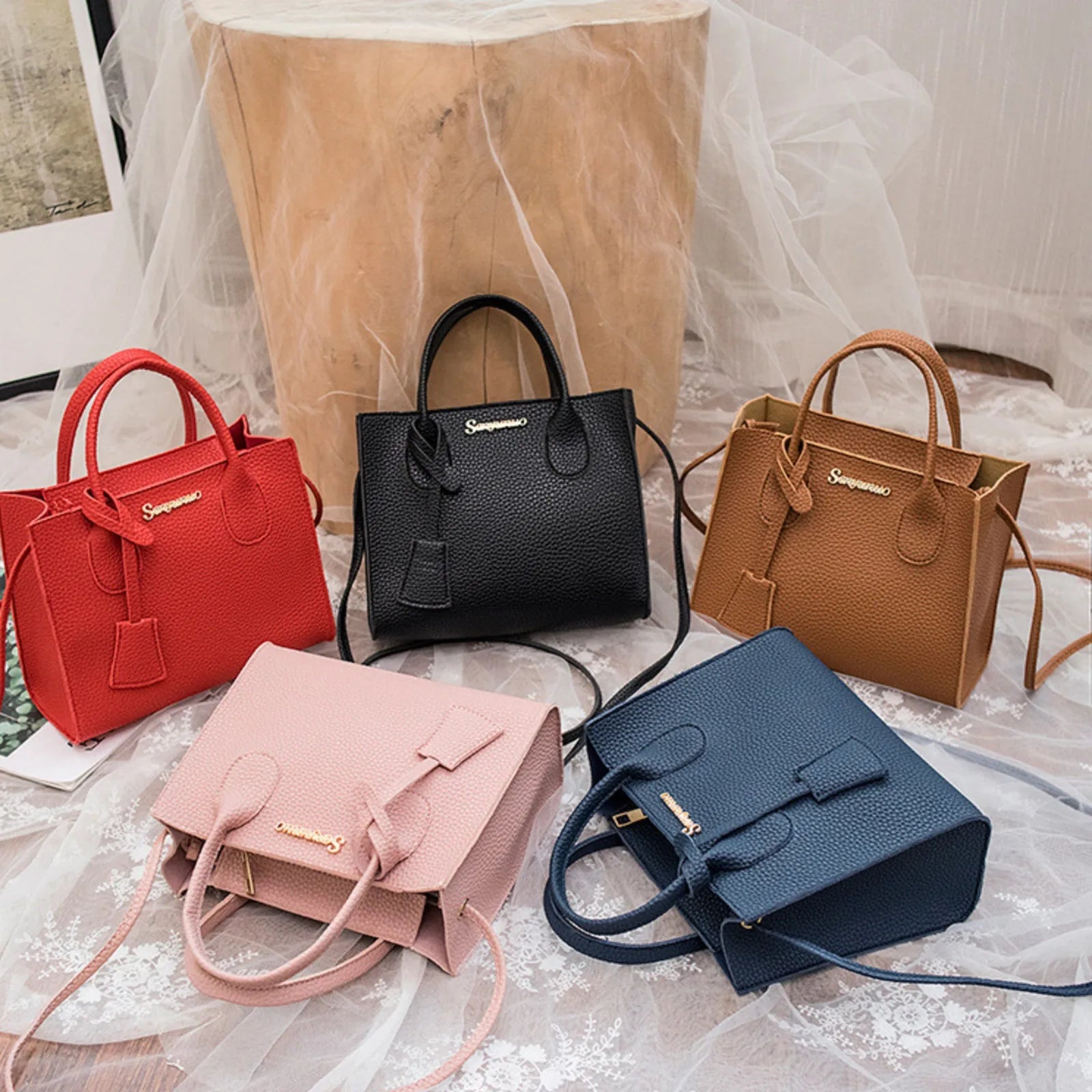 Carry your essentials in style with this versatile women's tote bag. Featuring a large capacity and made from casual PU leather, this crossbody handbag is perfect for adding a fashionable touch to your everyday look. -