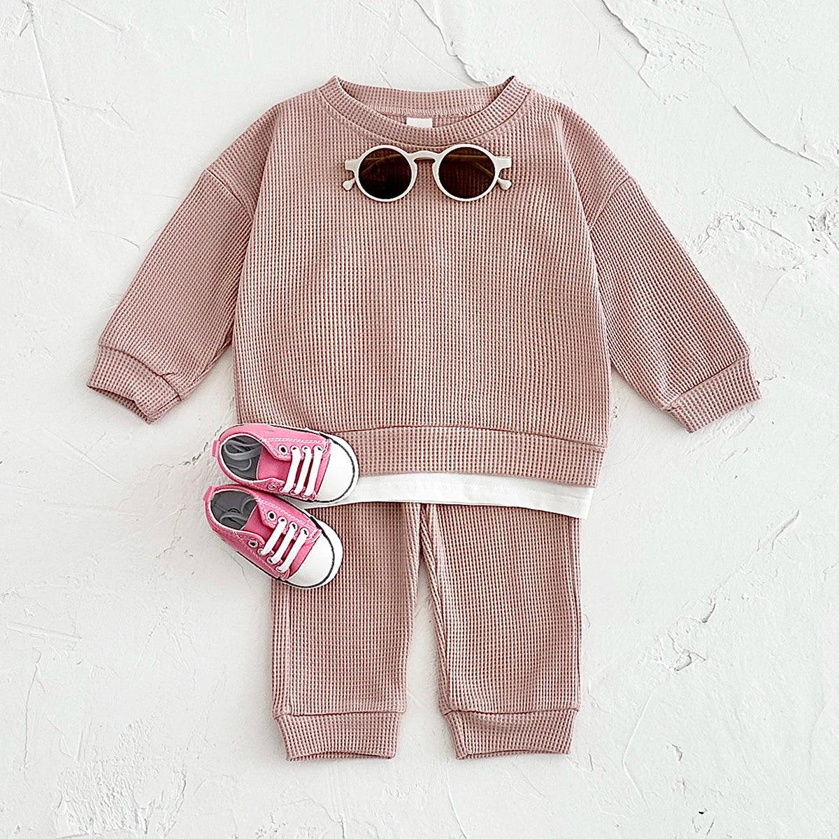 Dress your little one in comfort with this new baby clothes set—featuring a loose waffle cotton tracksuit perfect for kids on the move 0-3 Years Old -