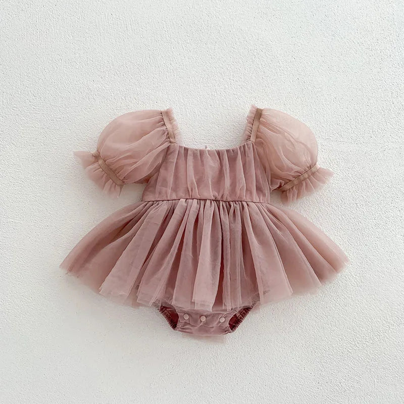 Dress your toddler in sweet style with this new baby lace dress featuring a big bowknot and short sleeves—perfect for special occasions! -