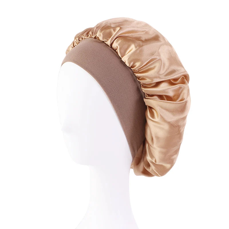 Protect your hair in style with these satin solid bonnets. Featuring a wide-brim design, these hats are perfect for night sleeping or bathing and are suitable for both men and women. -