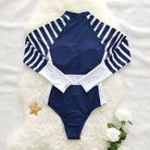 Stay stylish and protected from the sun in this long-sleeved one-piece swimwear for women! -