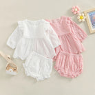 Keep your toddler cozy and cute in this 2-piece set featuring a solid color cutout round neck long sleeve top and matching bottoms—perfect for baby girls 3-24m! -
