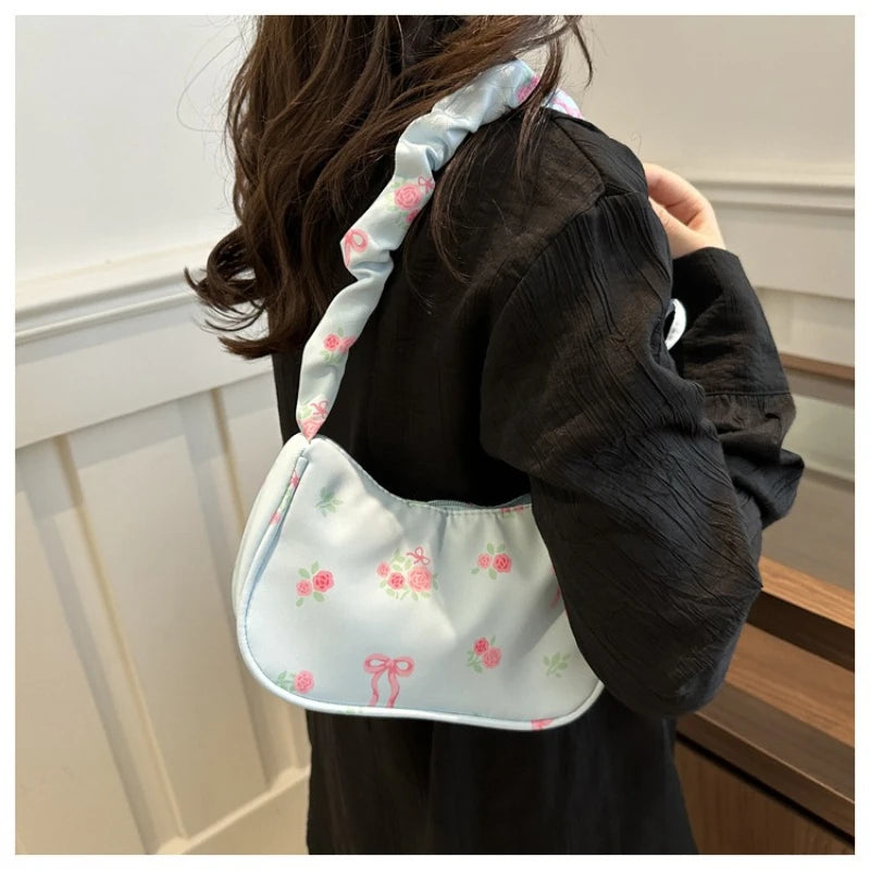 Stay stylish with these chic women's handbags made from nylon. Featuring a pleated design, these bags are perfect for the summer season, offering a trendy and functional accessory for your everyday outfits. -