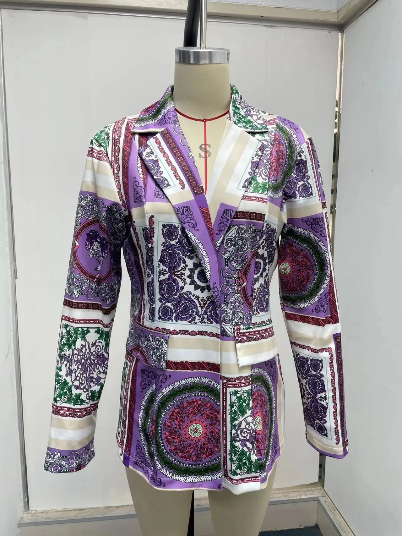Turn heads in this fashionable and sexy suit jacket that’s all about bold style and confidence! -