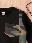Dress your little guy sharp and comfy with this two-piece baby boy set—long-sleeved round neck top paired with stylish camouflage pants! -