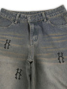 Rock the retro vibe with these baggy distressed low-rise vintage denim pants—loose, patched, and perfect for a cool mom style! -