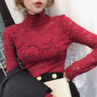 Achieve an elegant and feminine look with this long sleeve lace crochet top. The see-through design adds a touch of allure and sophistication to your outfit. -