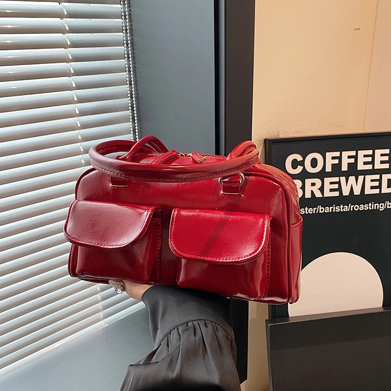 Accessorize stylishly with this black shoulder bag for women. This versatile handbag can be carried as a purse or a crossbody bag, making it a chic and practical choice for all occasions. -