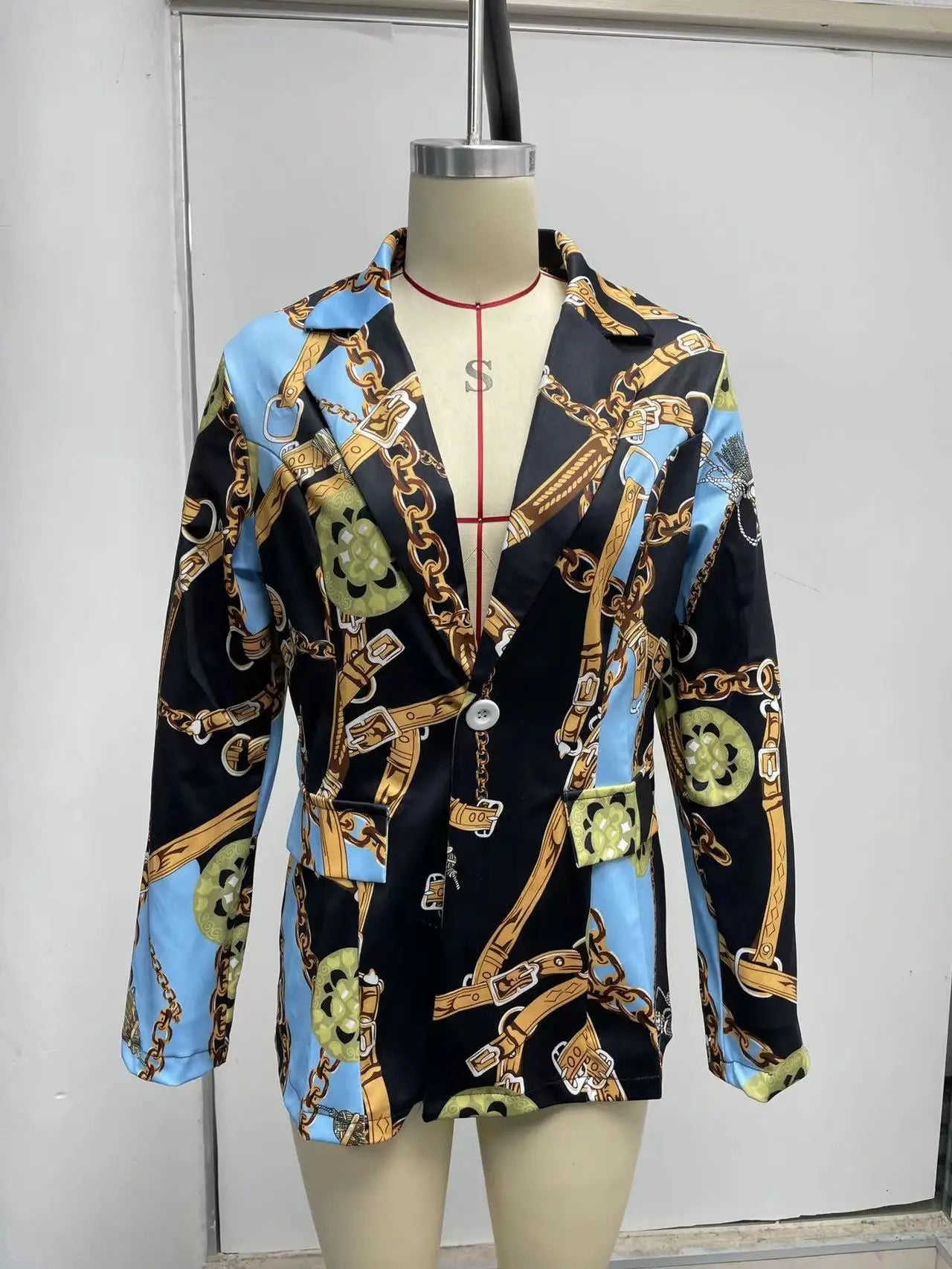 Turn heads in this fashionable and sexy suit jacket that’s all about bold style and confidence! -