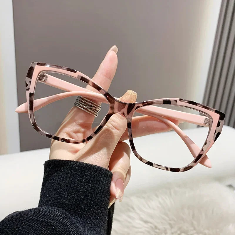 Protect your eyes with style using these cat-eye frames for women, featuring anti-blue light blocking lenses for comfortable and fashionable eyewear! -
