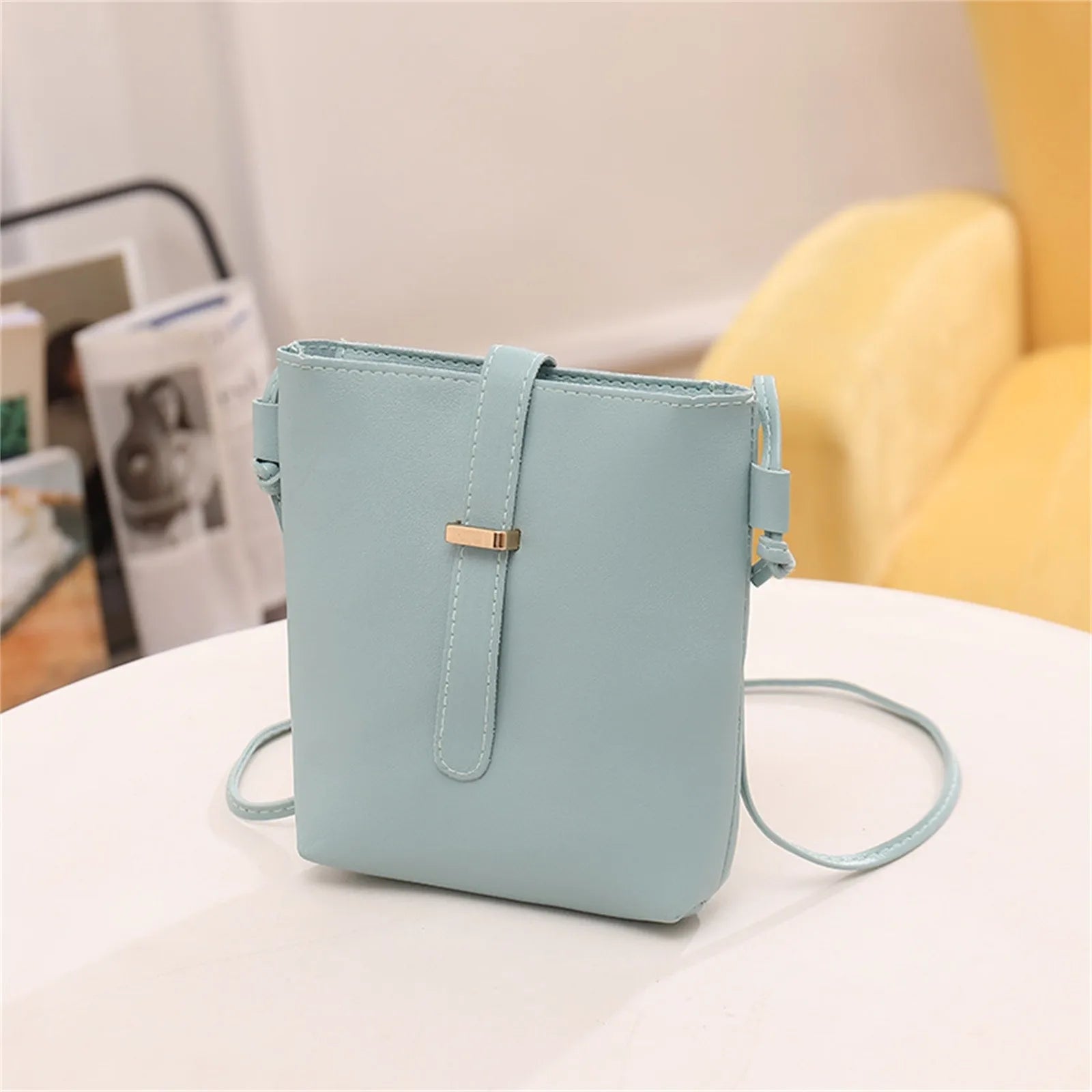 Stay on trend with this fashionable drawstring lady bag, featuring a stylish cross-border design and casual letter detail. Perfect for adding a chic and trendy touch to your outfit! -