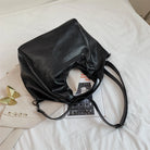 Make a stylish statement with these large shoulder bags designed for women. Crafted from soft leather, these fashionable handbags are perfect for adding a touch of sophistication to any outfit. -