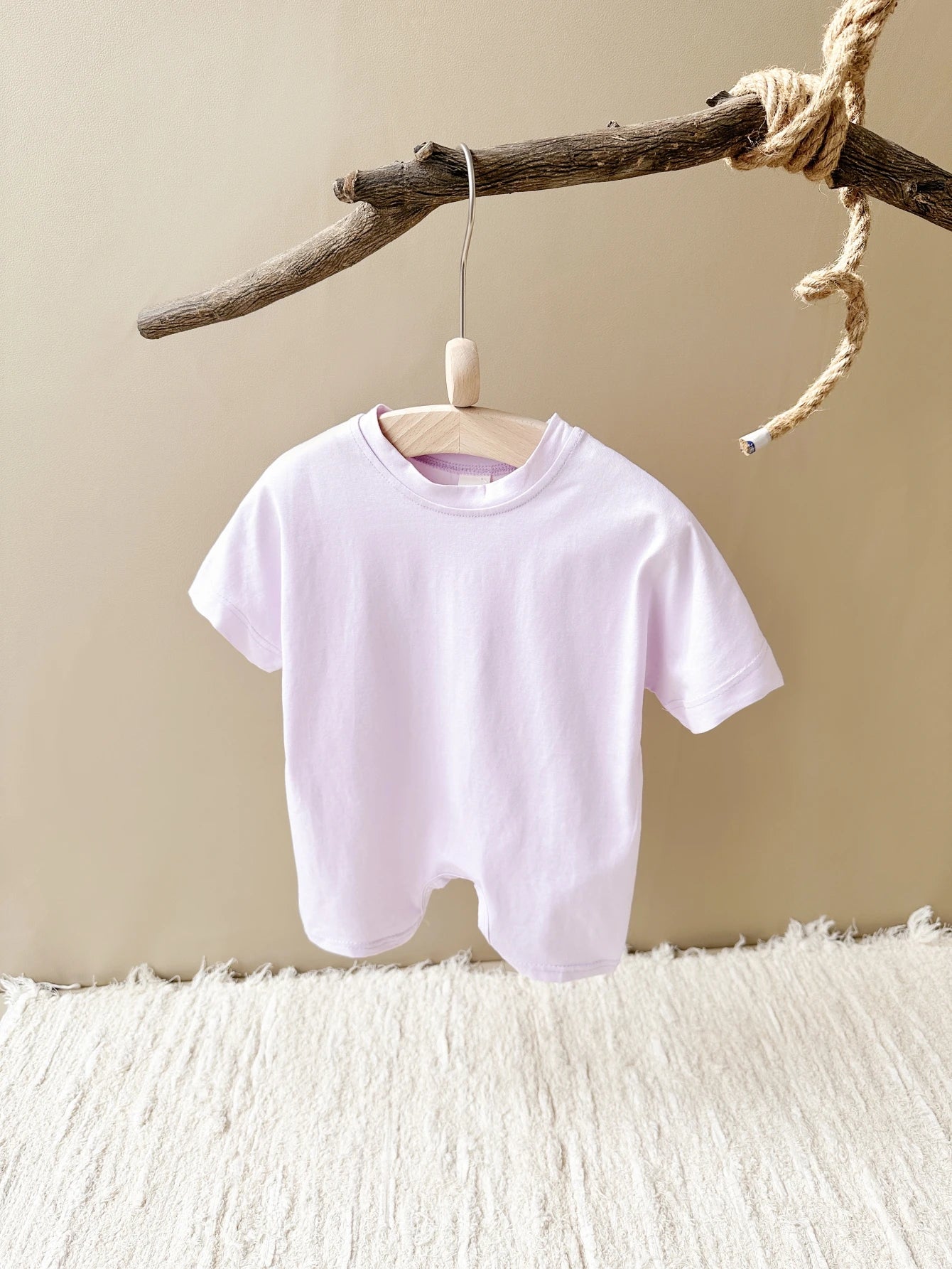 Keep your baby boy comfy and cute with this basic romper, perfect for ages 0-1 year! -