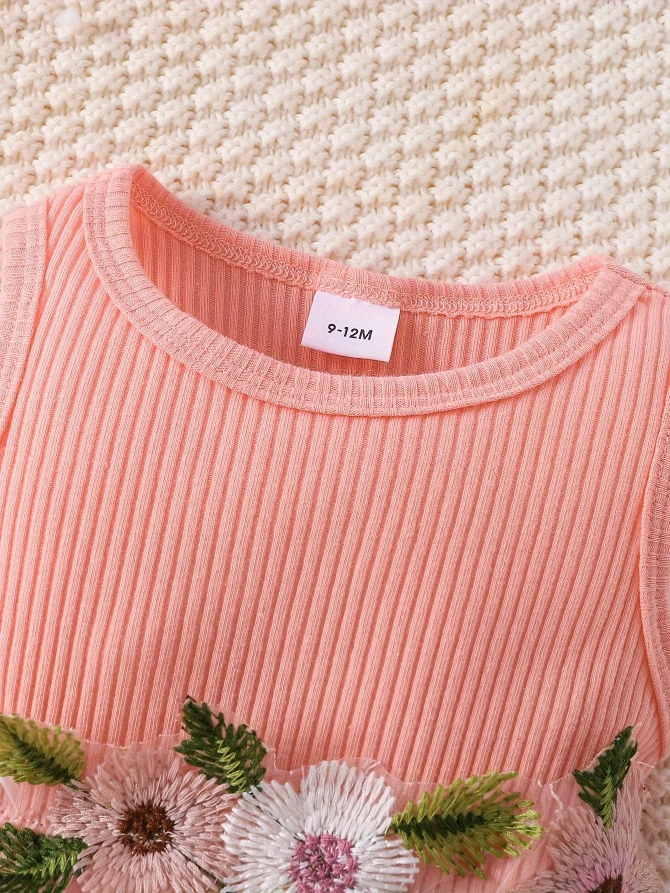 Dress your little princess in style with this pink waffle cardigan and embroidered dress set—perfect for ages 1-2 years and adding a cozy, elegant touch! -
