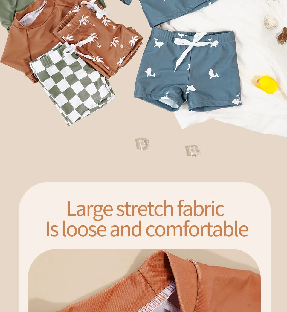 Make a splash in style with this fashionable and cute long-sleeve swimsuit for baby boys and girls—perfect for pool days and swim fun! -