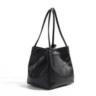 Stay on-trend with this bucket bag—a new fashion staple that offers simplicity, versatility, and a touch of classic style to elevate your wardrobe! -