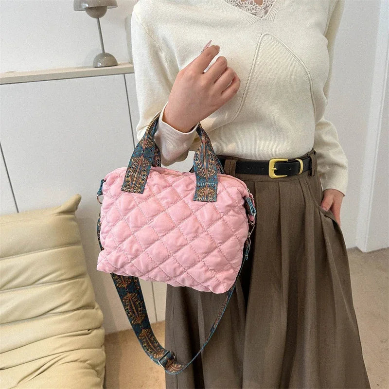 Elevate your style with these luxury designer shoulder crossbody bags for women. Featuring a quilted padded design from a top designer brand, these handbags are perfect for adding a touch of elegance to any outfit. -