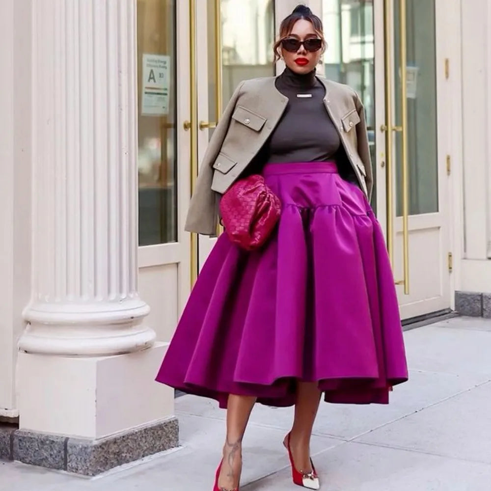 Combine elegance and practicality with these mid-calf satin women's skirts featuring handy pockets! -