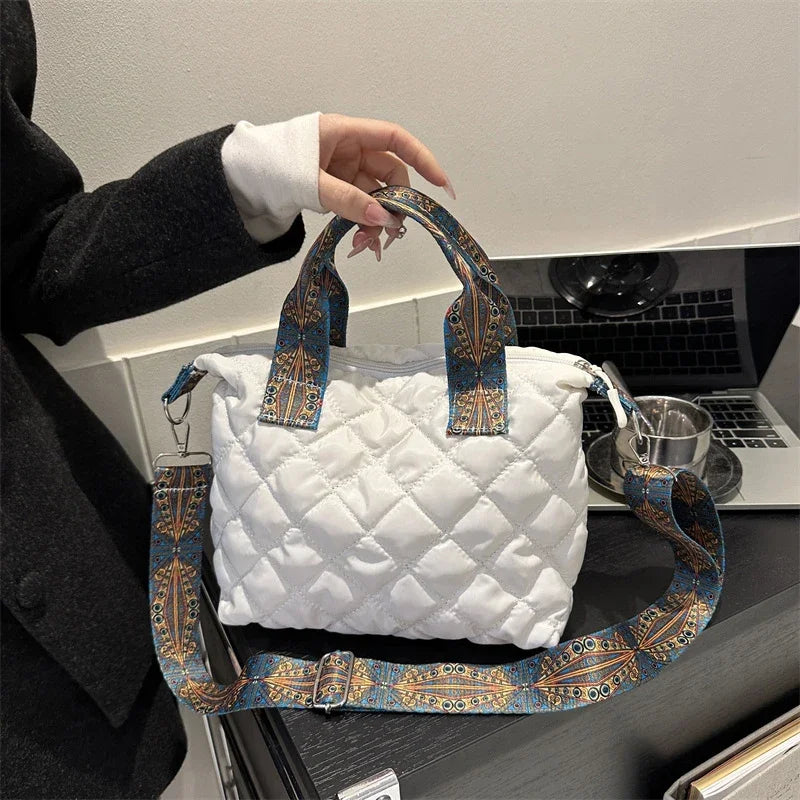 Elevate your style with these luxury designer shoulder crossbody bags for women. Featuring a quilted padded design from a top designer brand, these handbags are perfect for adding a touch of elegance to any outfit. -