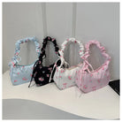 Stay stylish with these chic women's handbags made from nylon. Featuring a pleated design, these bags are perfect for the summer season, offering a trendy and functional accessory for your everyday outfits. -