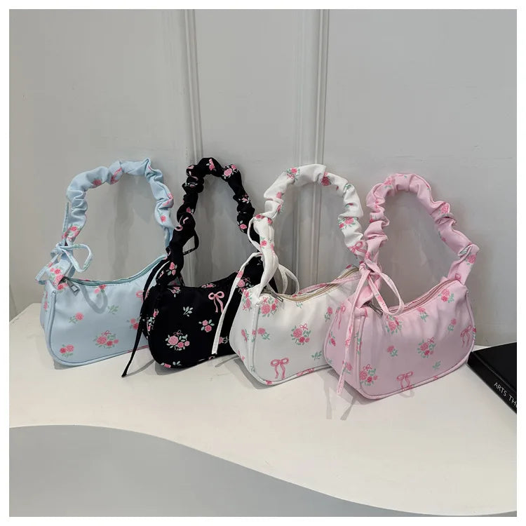 Stay stylish with these chic women's handbags made from nylon. Featuring a pleated design, these bags are perfect for the summer season, offering a trendy and functional accessory for your everyday outfits. -