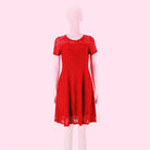 Make a chic statement with this elegant women's dress featuring an O-neck design, transparent lace, and hollow detail—a perfect choice for a sophisticated and stylish look. -