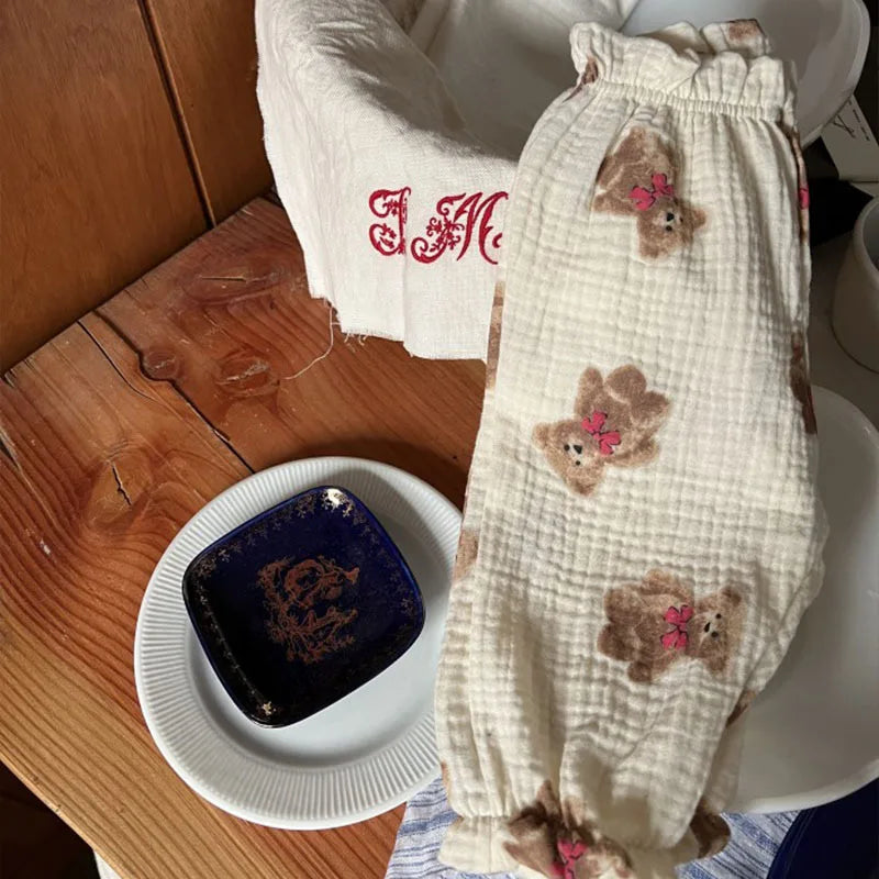 Keep your little ones comfy and cute in these organic cotton loose-fit baby pants—featuring playful tiger, bear, and floral prints perfect for boys and girls! -