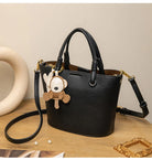 Upgrade your accessories with this new bucket bag for women. Featuring a fashionable and versatile design, this handheld bag is perfect for adding a chic and trendy touch to your look. -