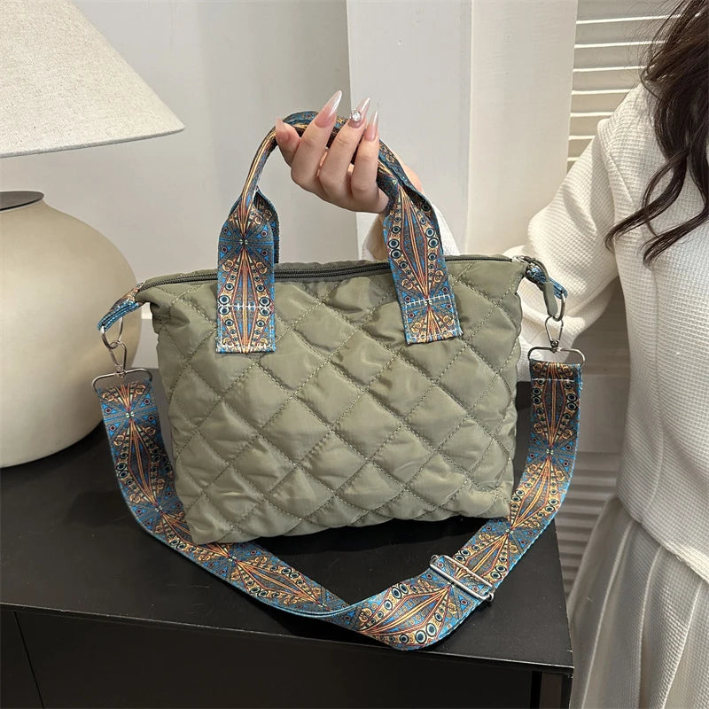 Elevate your style with these luxury designer shoulder crossbody bags for women. Featuring a quilted padded design from a top designer brand, these handbags are perfect for adding a touch of elegance to any outfit. -