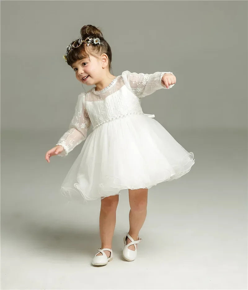 Make your baby girl shine in this elegant long-sleeve white party dress—perfect for special occasions! -
