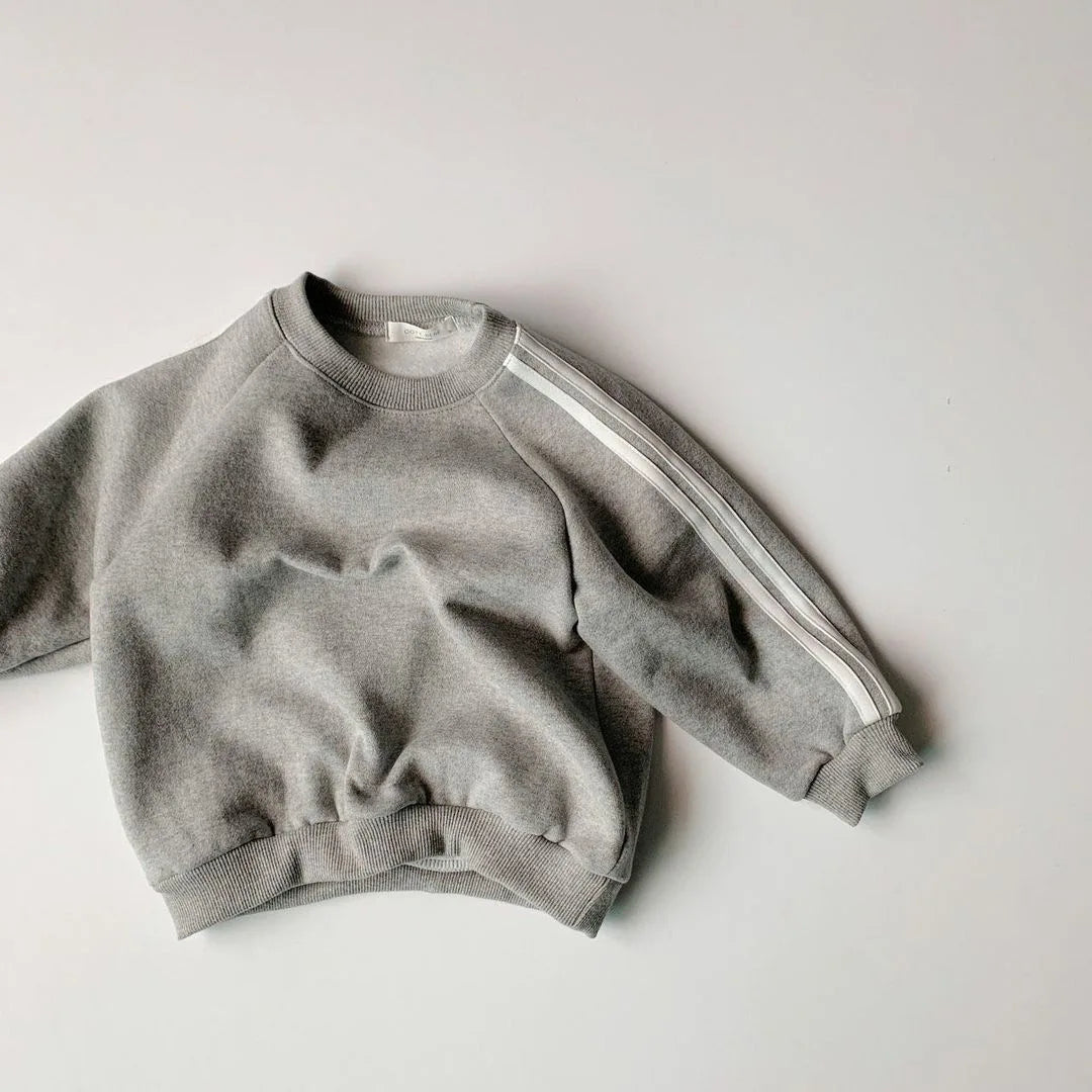 Keep your little one stylish and comfy with this cool two-piece baby suit—featuring a letter-printed zip-up top and matching leisure sports pants! -