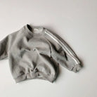 Keep your little one stylish and comfy with this cool two-piece baby suit—featuring a letter-printed zip-up top and matching leisure sports pants! -