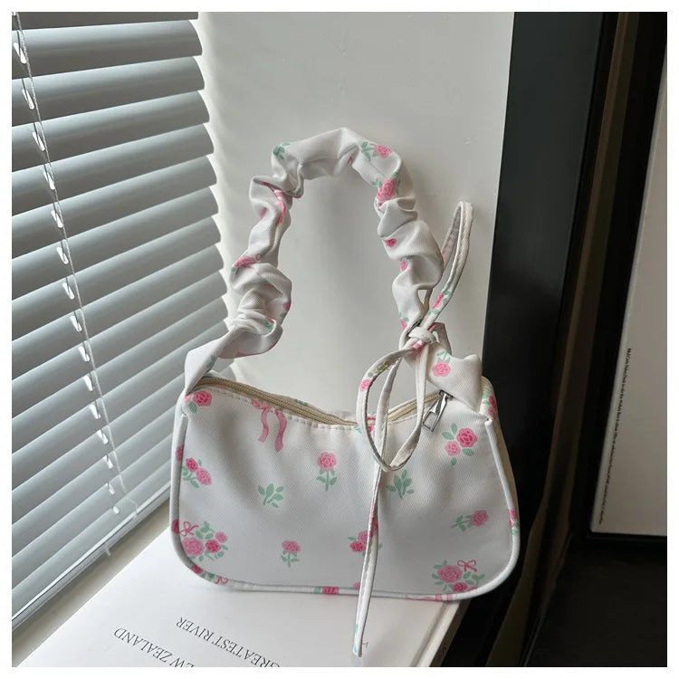 Stay stylish with these chic women's handbags made from nylon. Featuring a pleated design, these bags are perfect for the summer season, offering a trendy and functional accessory for your everyday outfits. -