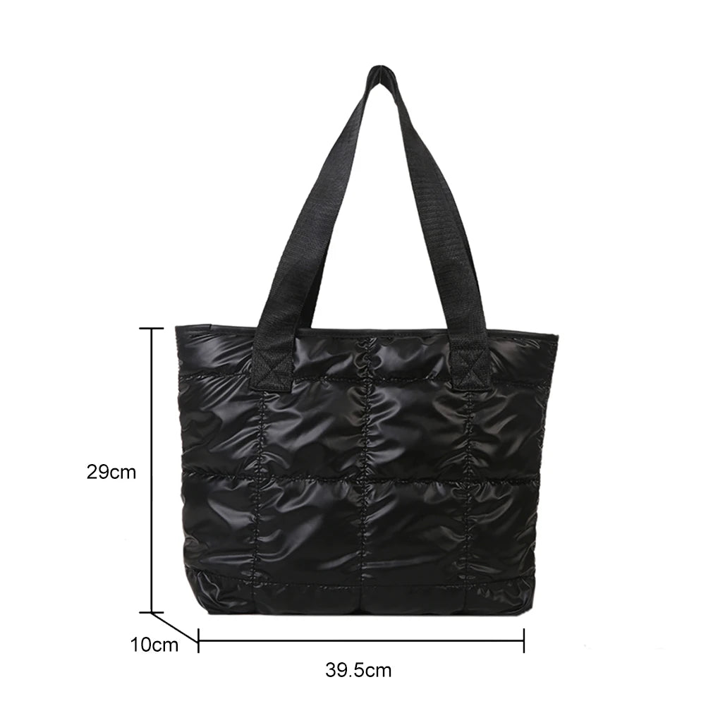 Stay stylish and organized with this fashion women's tote bag. Featuring a large capacity and cotton-padded design, this chic accessory is perfect for women who prioritize both style and functionality in their handbag. -