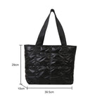Stay stylish and organized with this fashion women's tote bag. Featuring a large capacity and cotton-padded design, this chic accessory is perfect for women who prioritize both style and functionality in their handbag. -