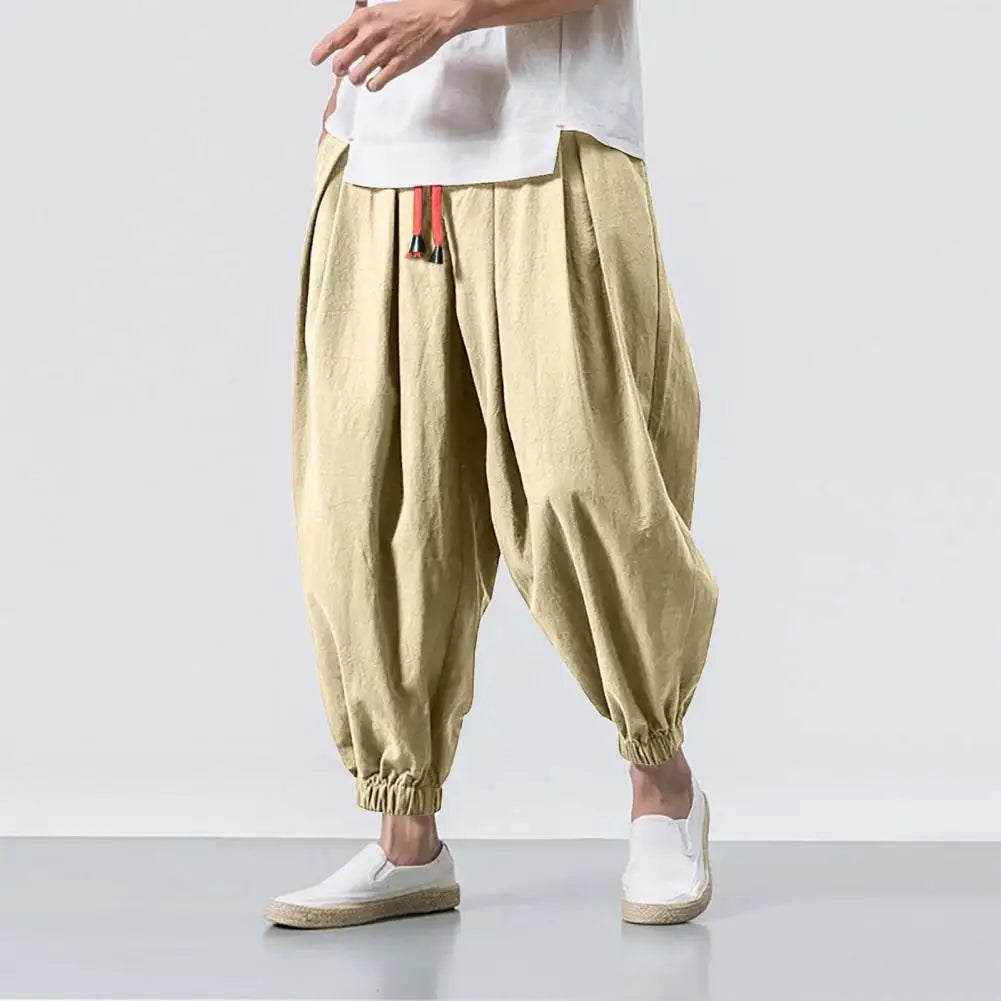 Stay comfortable and stylish in these men's baggy jogging pants featuring a drawstring waist—an ideal choice for a relaxed and casual look! -