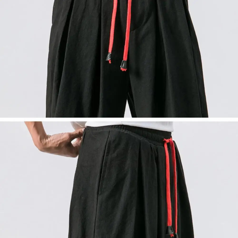 Stay comfortable and stylish in these men's baggy jogging pants featuring a drawstring waist—an ideal choice for a relaxed and casual look! -