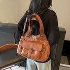 Make a statement with these luxurious handbags for women, crafted from leather and designed to be worn as shoulder bags. Elevate your style with these sac de luxe femme accessories, perfect for a chic and sophisticated look! -