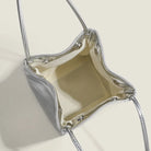 Stay on-trend with this bucket bag—a new fashion staple that offers simplicity, versatility, and a touch of classic style to elevate your wardrobe! -