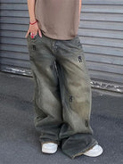 Rock the retro vibe with these baggy distressed low-rise vintage denim pants—loose, patched, and perfect for a cool mom style! -