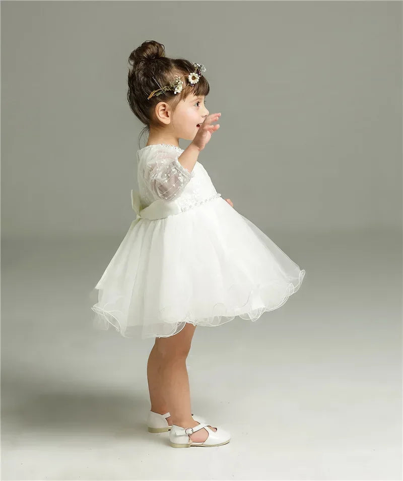 Make your baby girl shine in this elegant long-sleeve white party dress—perfect for special occasions! -
