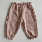Keep your little ones comfy and cute in these organic cotton loose-fit baby pants—featuring playful tiger, bear, and floral prints perfect for boys and girls! -