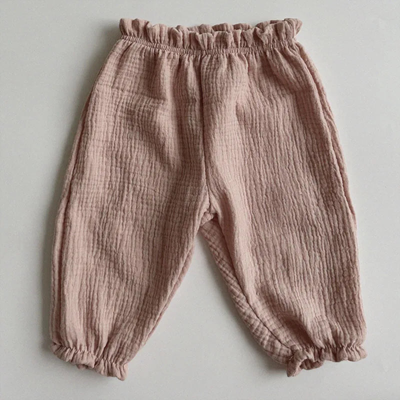 Keep your little ones comfy and cute in these organic cotton loose-fit baby pants—featuring playful tiger, bear, and floral prints perfect for boys and girls! -