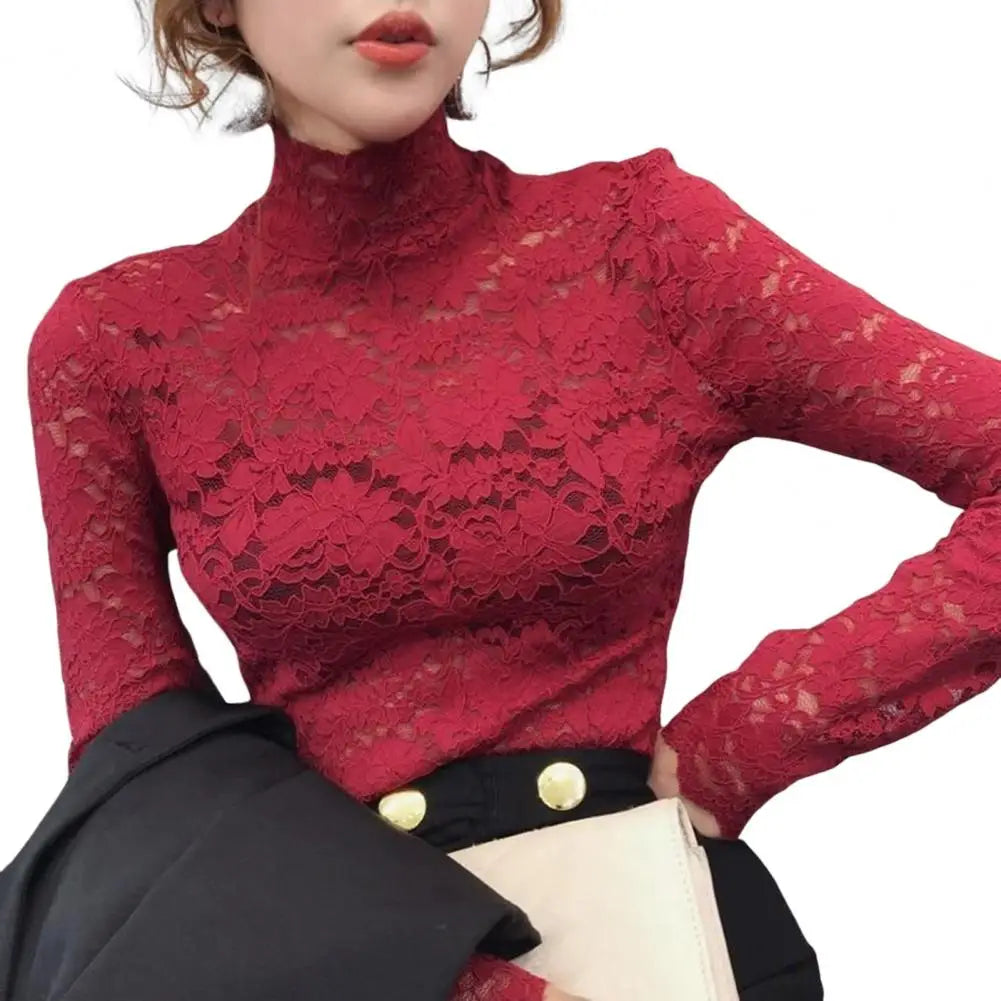 Achieve an elegant and feminine look with this long sleeve lace crochet top. The see-through design adds a touch of allure and sophistication to your outfit. -
