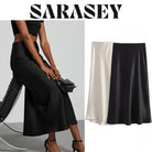 Elevate your elegance with this sleek black satin skirt for women—perfect for any occasion! -