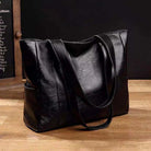 Carry all your essentials in style with this large capacity tote bag designed for women. The single shoulder handbag is crafted from soft leather, providing a chic and versatile accessory for any outfit. -