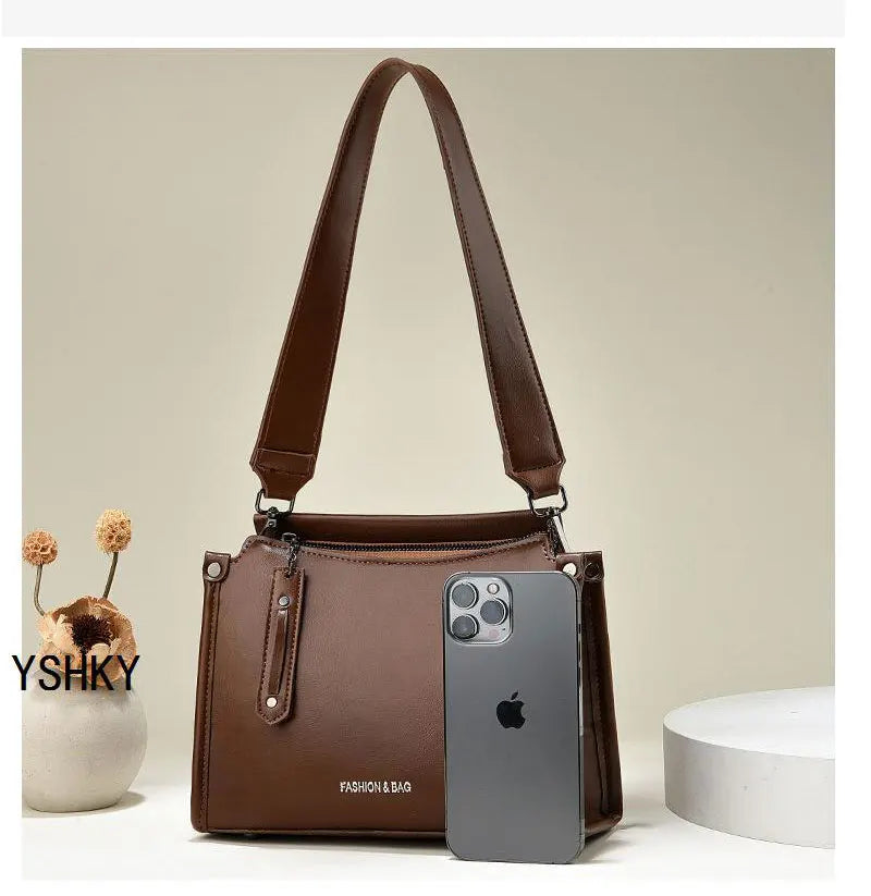 Elevate your style with this luxury designer crossbody bag for women, featuring a fashionable and chic color. Perfect for adding a touch of sophistication to your ensemble! -