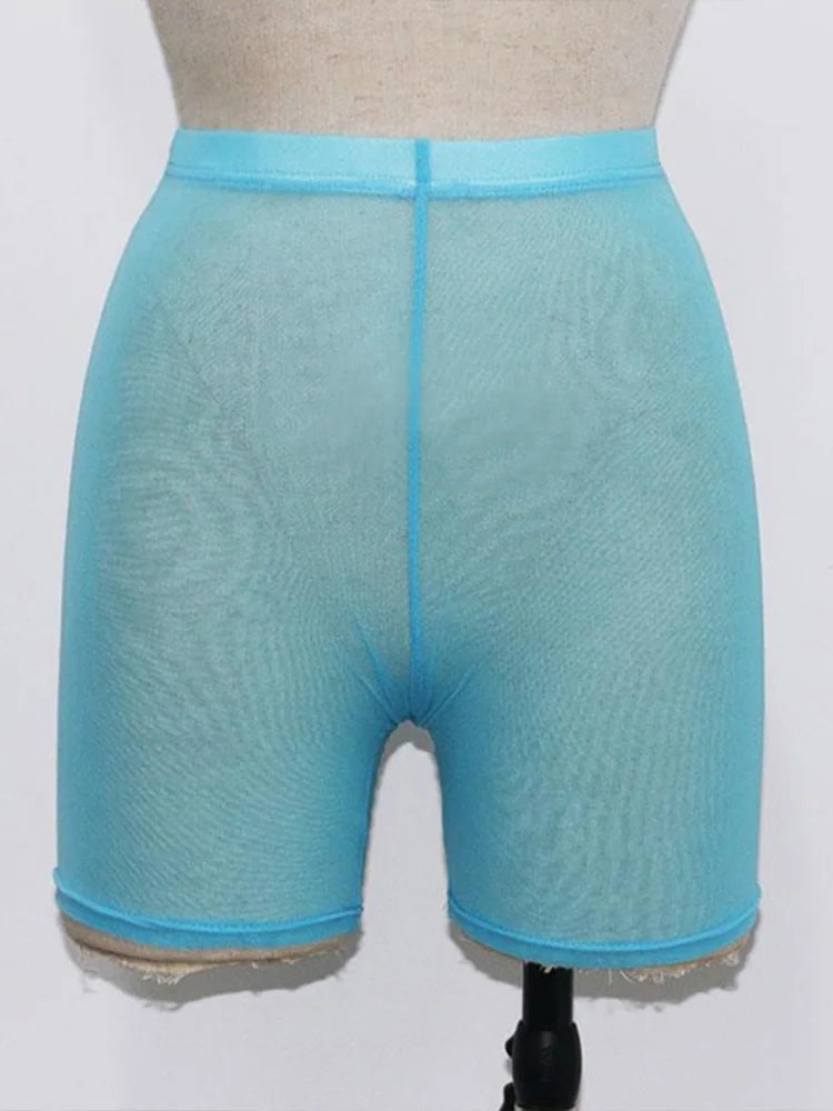 Stay stylish and comfortable with these yellow mesh transparent casual shorts for women—perfect for a fashionable and chic look! -